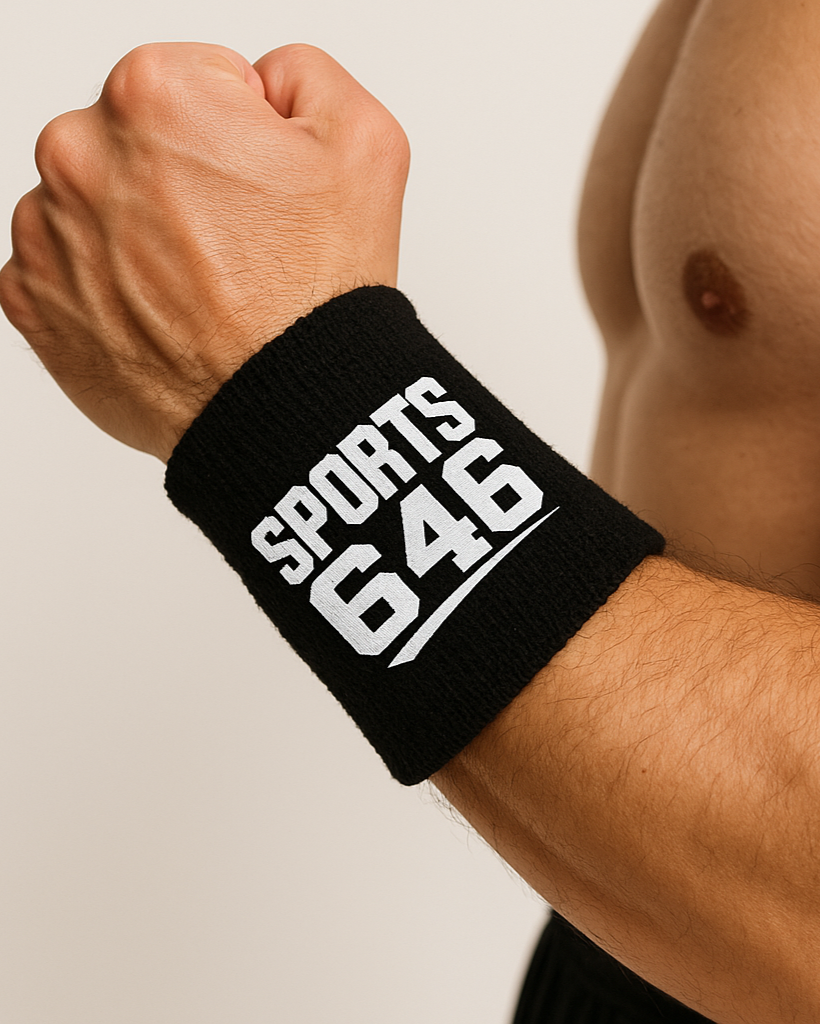 Black wristband with 'SPORTS 646' text on a person's wrist